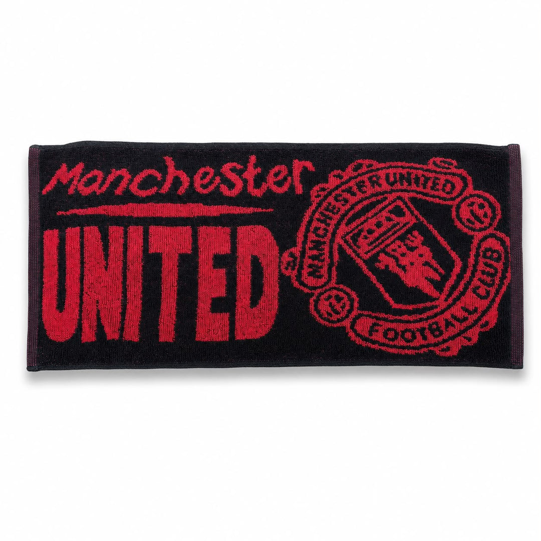 Black and red Manchester United woven bar towel with club crest
